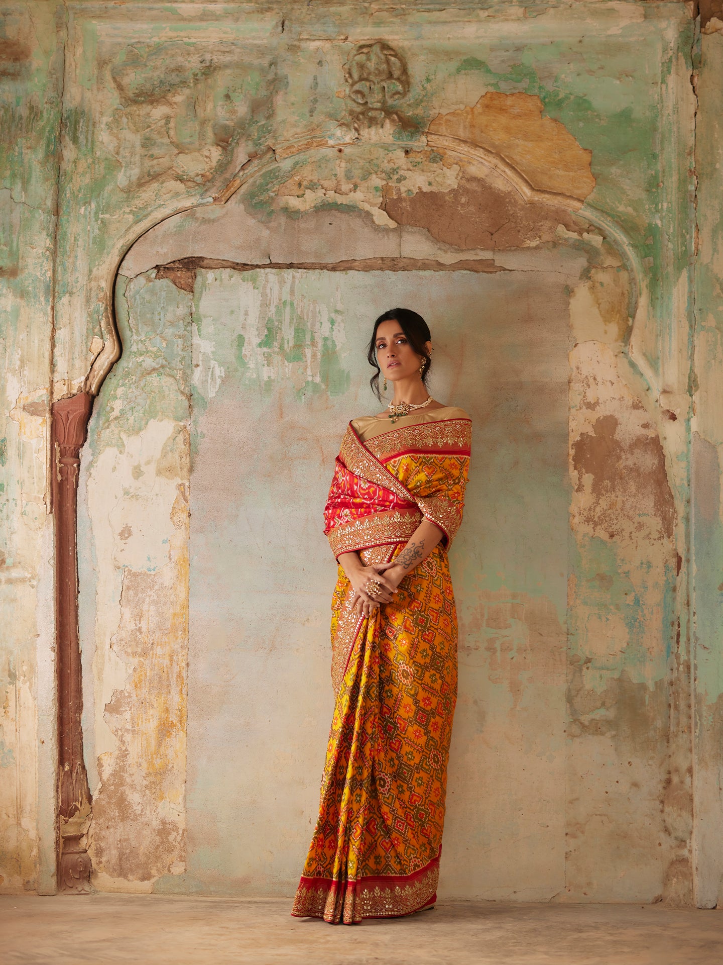 Mustard and Red Saree in Pure Patola Silk with Gota Patti & Pearls embroidery