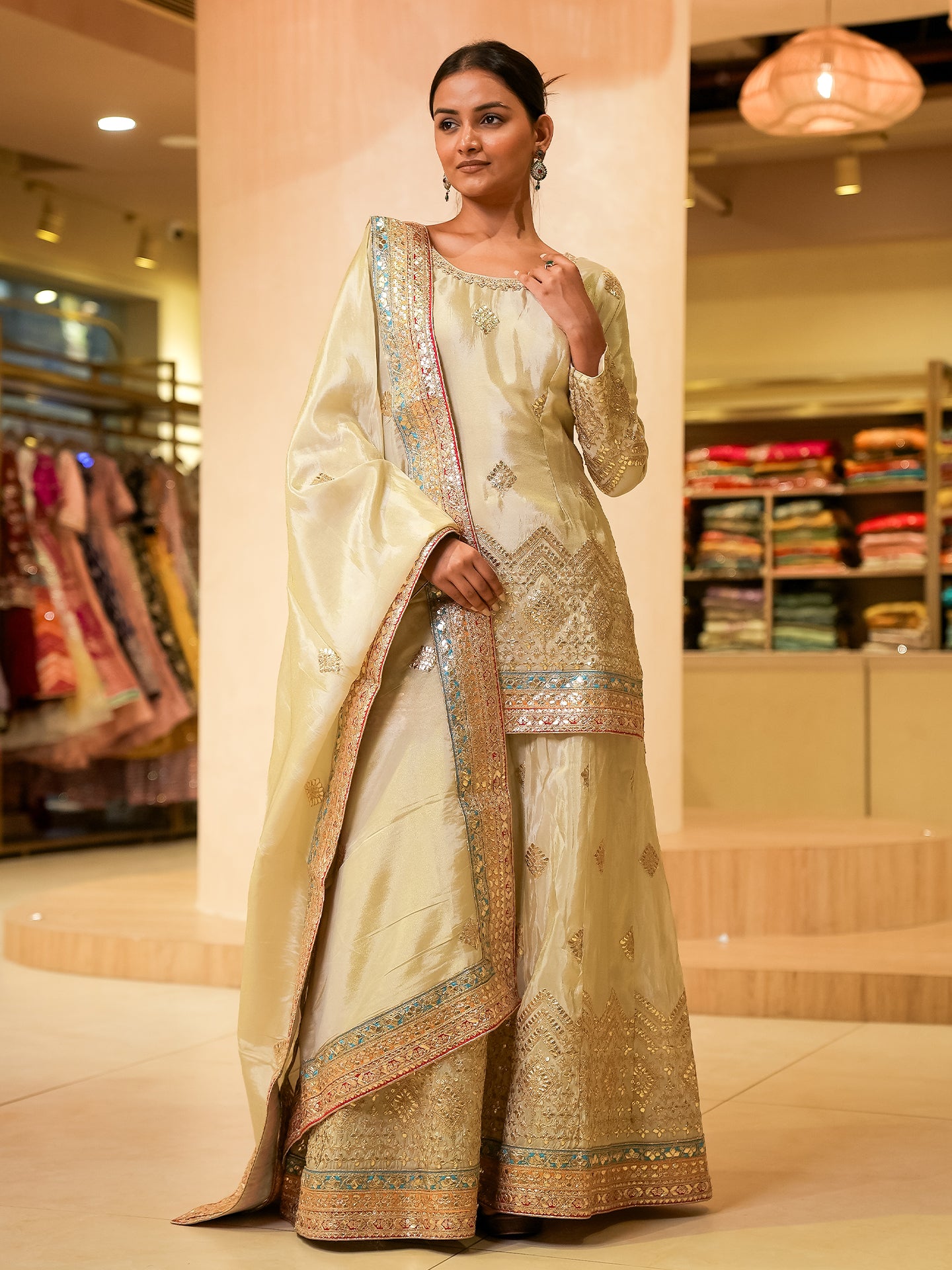 Draped in silk elegance this sharara set steals the spotlight