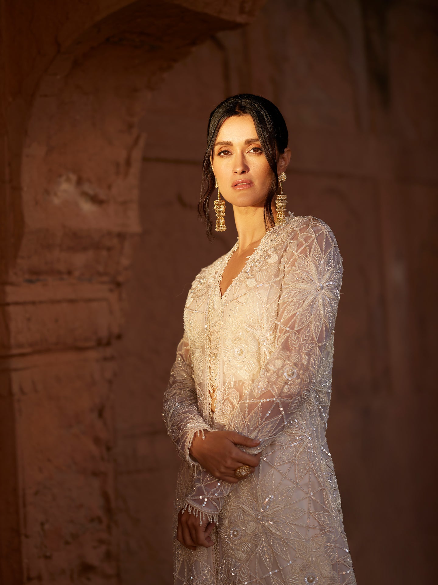 Ivory Indo-Western in Lycra Net with Pearls & Sequence embroidery
