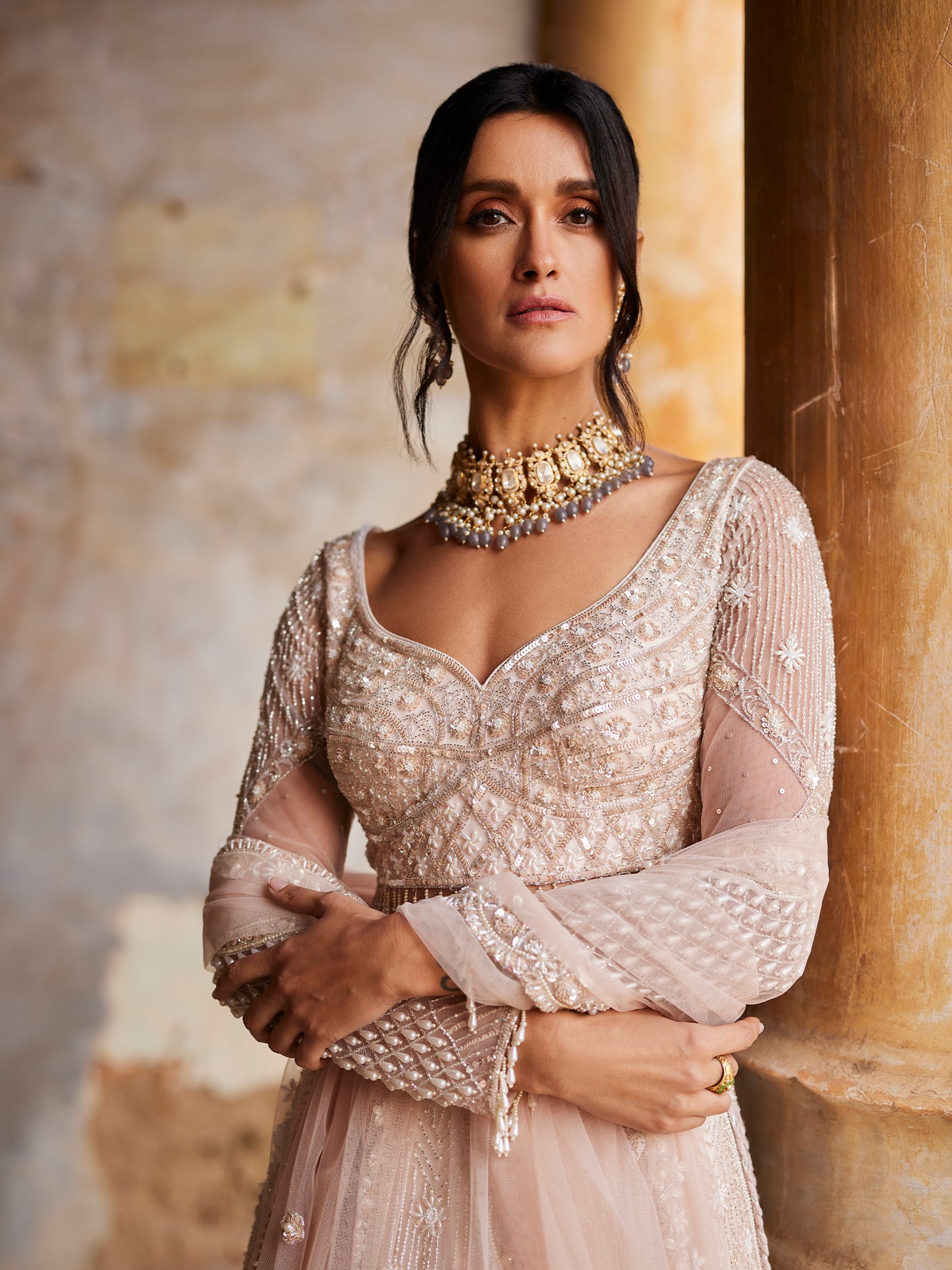 Chic Peach Lehenga in net with Sequence & Pearls Jaal embroidery