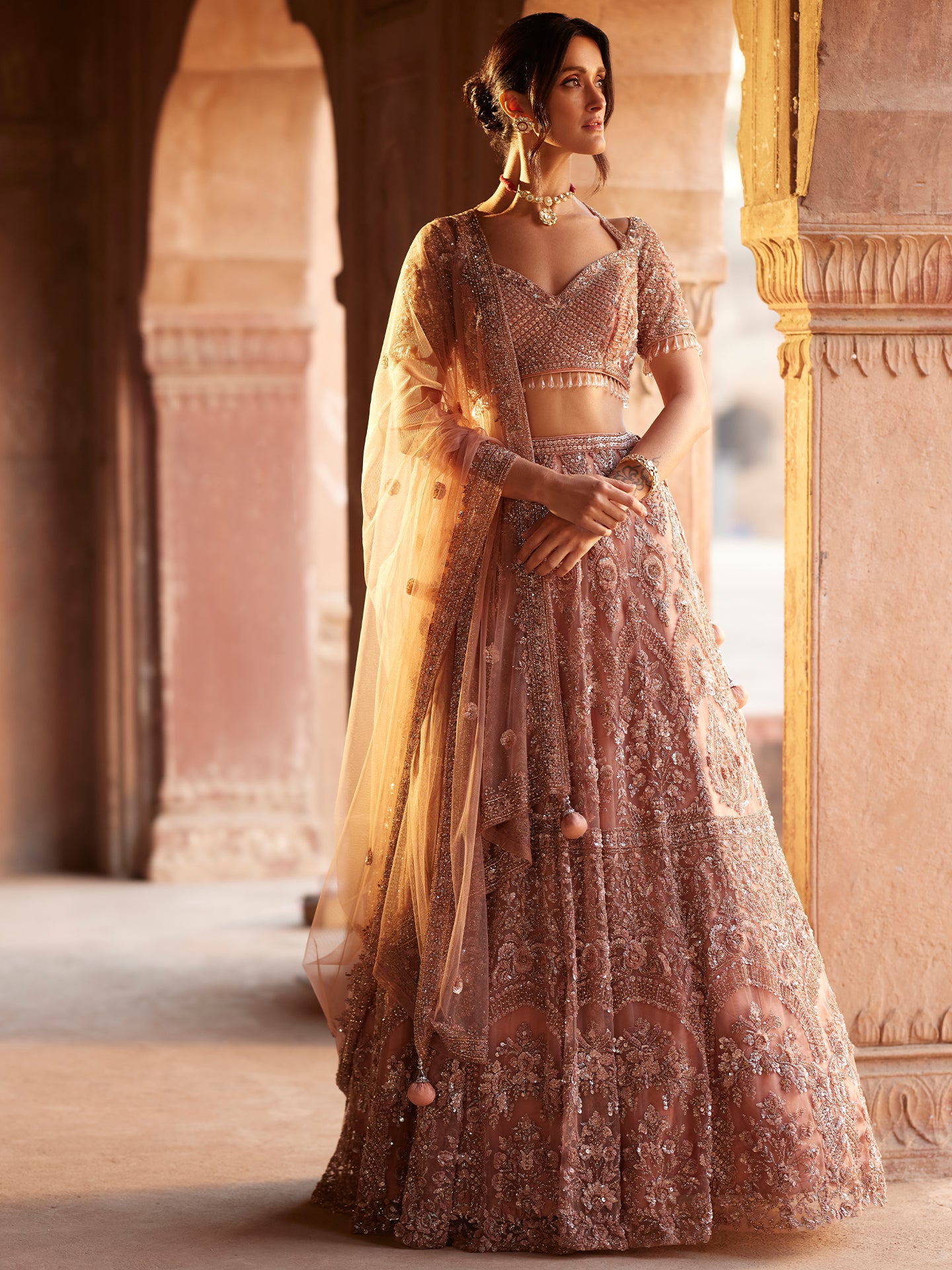 Rose gold Lehenga in net with Katdana & Sequence Jaal embroidery