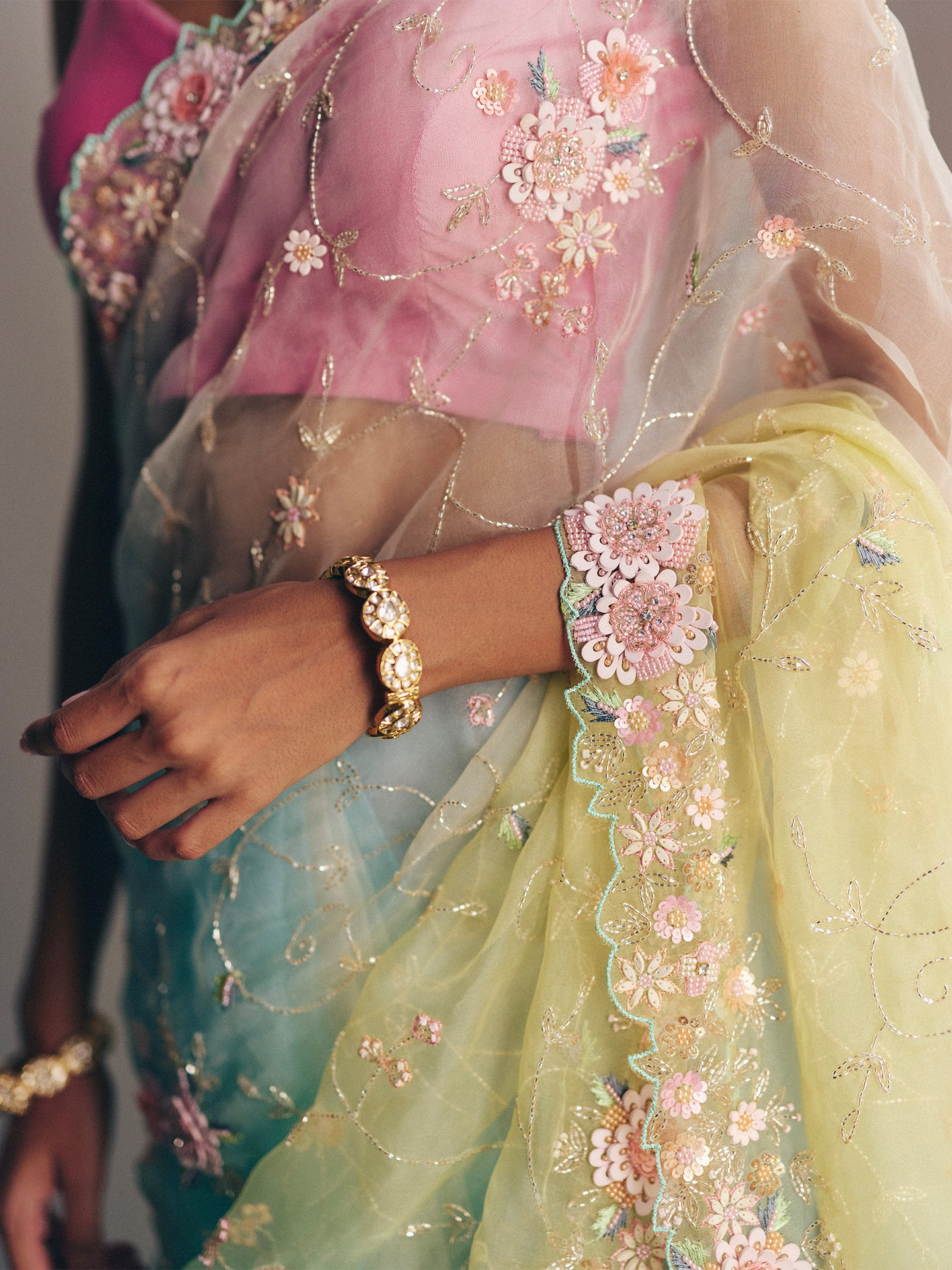 Green Organza Saree with Cutdana, Sequins, and Pearl Detailing