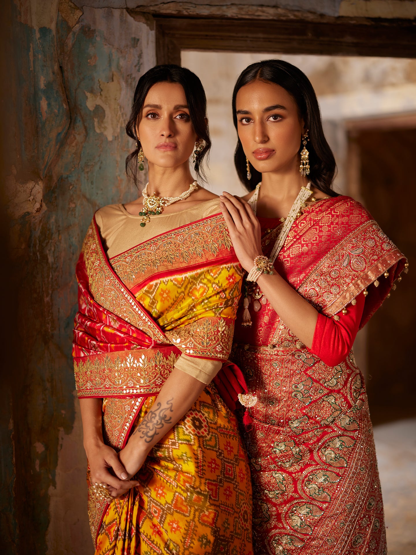 Mustard and Red Saree in Pure Patola Silk with Gota Patti & Pearls embroidery