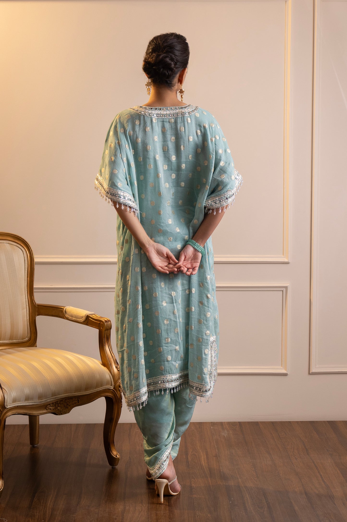 Step into elegance with this stunning kaftan and pant set