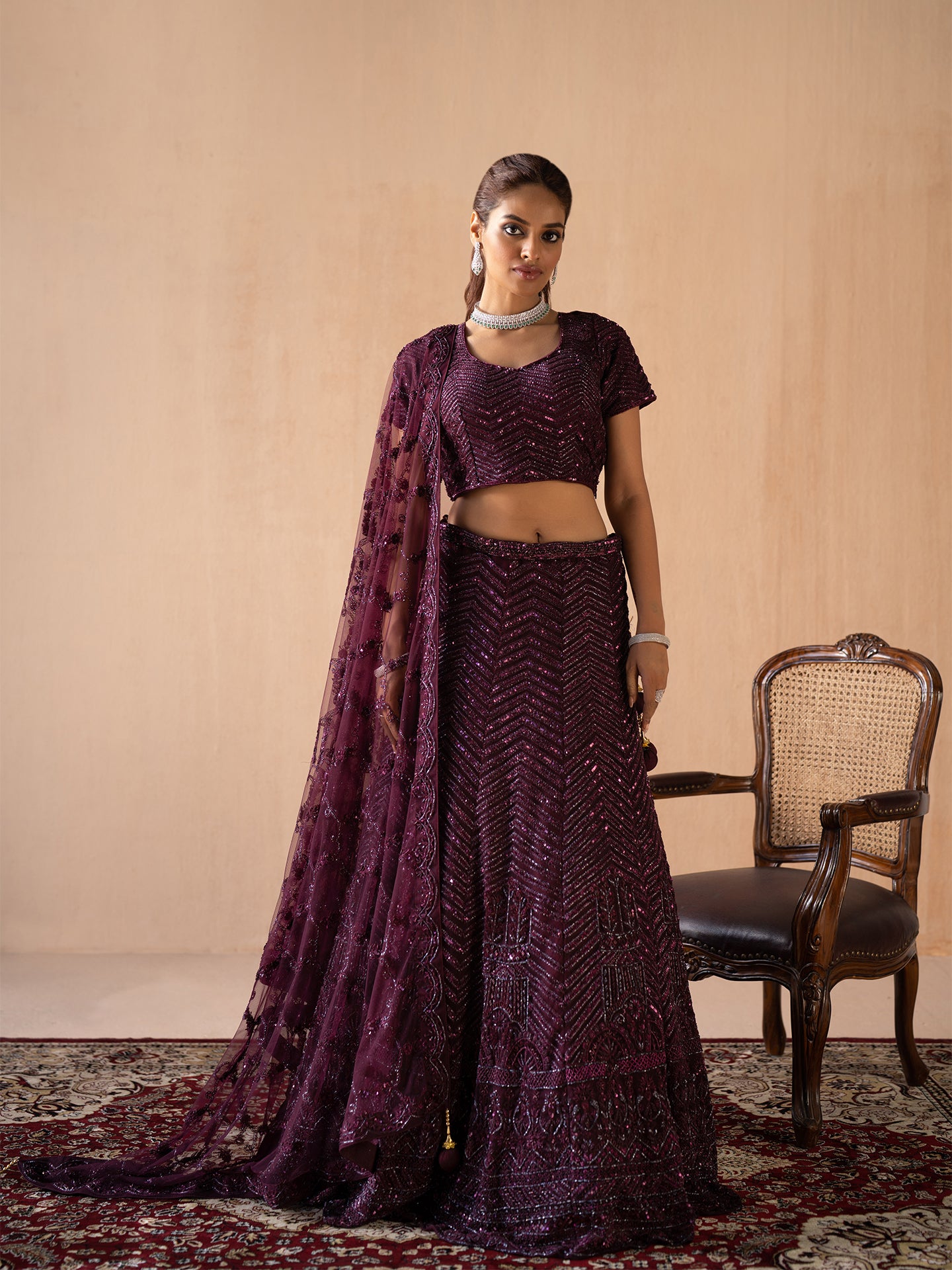 Exquisite handmade lehenga in wine colour.