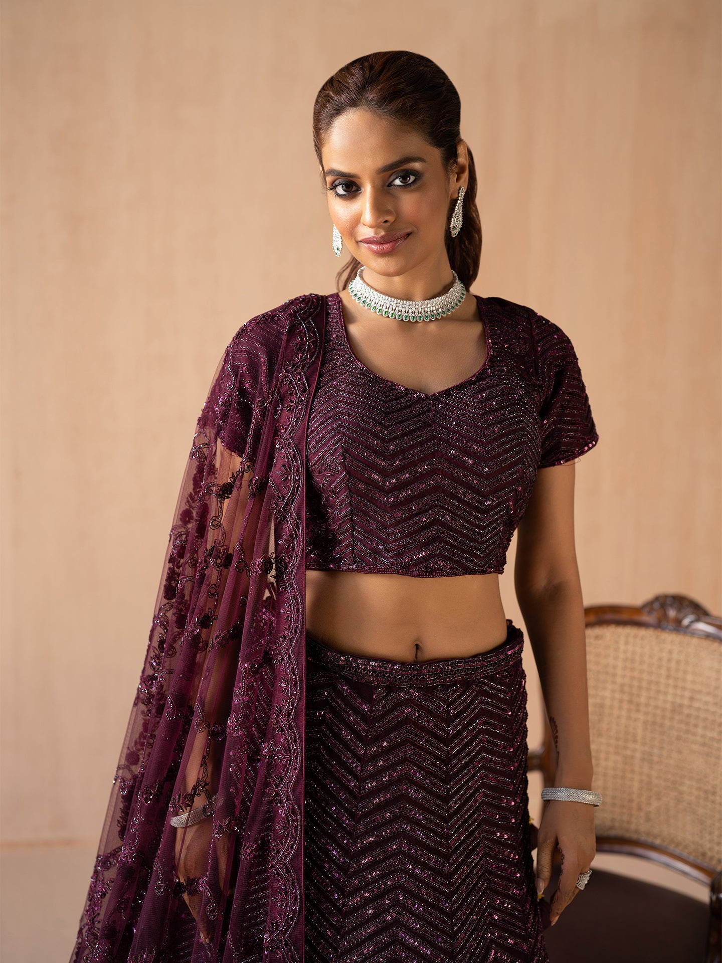 Exquisite handmade lehenga in wine colour.