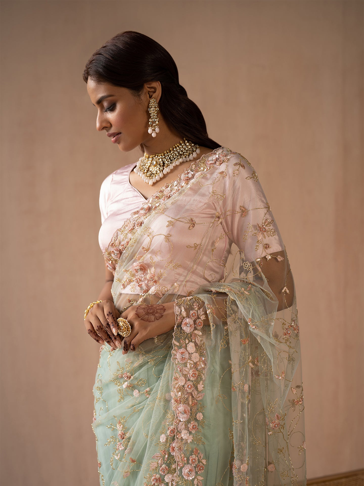 Dreamy sky blue saree in net with nakshi & sequin work .